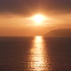 Sunset On Calm Sea With Island At Background - VideoHive Item for Sale