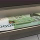 10000 South Korean won in cash dispenser. Withdrawal of cash from an ATM. - VideoHive Item for Sale
