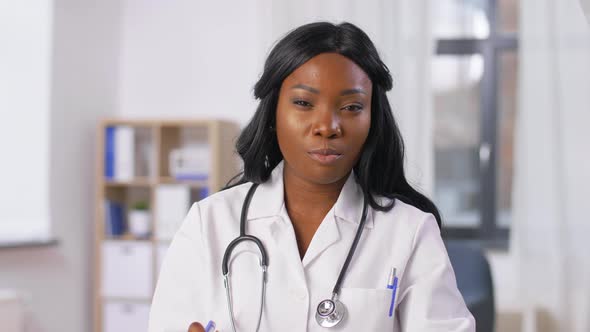 African American Doctor Having Online Consultation
