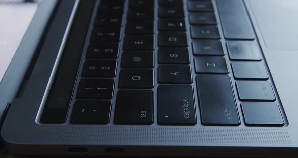 Gray Modern Laptop Keyboard Close-up Dolly Shot