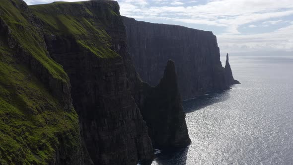 Drone Of Coastline And Sea Stack Of Suduroy