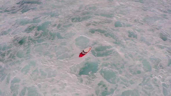 Aerial view of a lost surfboard in Hawaii.