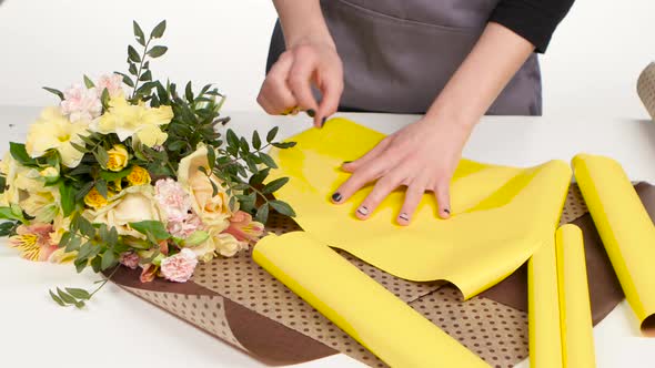 Flower Shop. Arranging of Flower Bouquet. White. Close Up