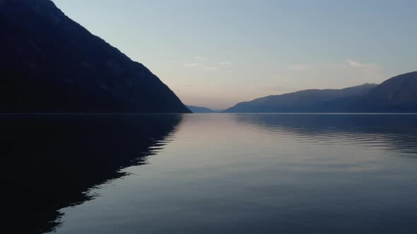 Sunset landscape with lake Teletskoye and mountains in Altai