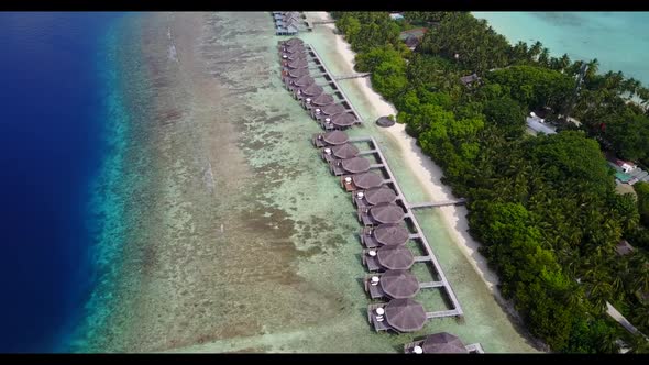 Aerial landscape of tranquil coast beach time by transparent water with white sand background of a d