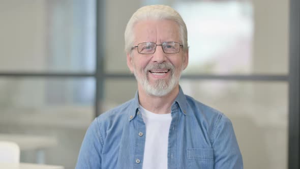 Portrait of Senior Old Man Smiling at Camera