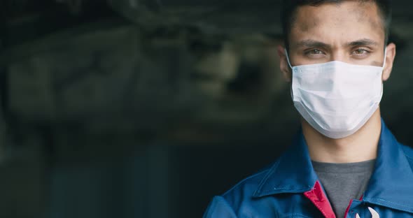 Tracking Shot Portrait of Professional Care Repair Service Worker Wearing Protective Medical Mask