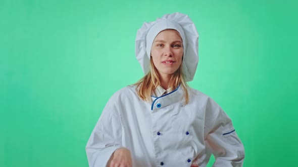 Young Baker Woman Playing in Front of the Camera