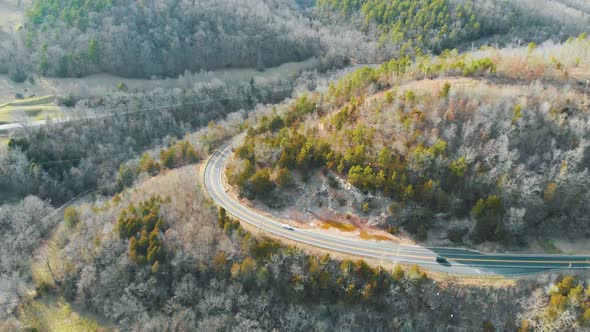 Aerial of Cars Driving On Curvy Scenic Road