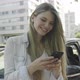 Young woman using smartphone - VideoHive Item for Sale