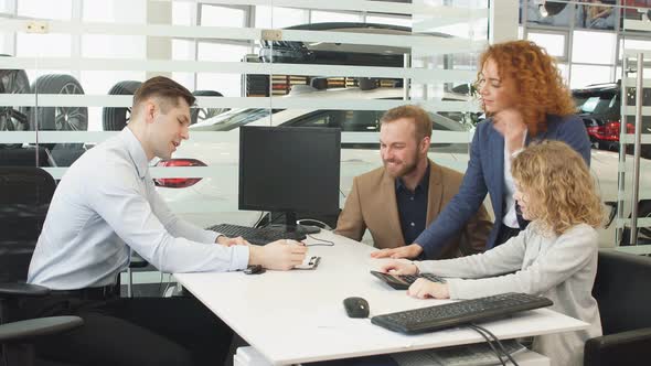 Caucasian Family in Dealership