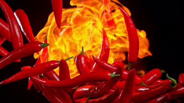 Super Slow Motion Shot of Red Chilli Peppers and Fire at 1000Fps.