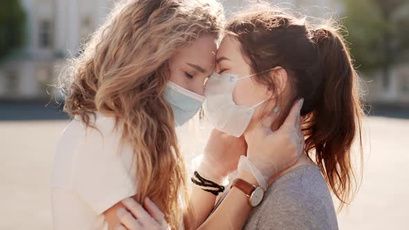 Young Womans Take Off Medical Mask and Kiss