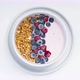 Smoothie bowls with granola, blueberries and raspberries on a white background. Healthy breakfast st - VideoHive Item for Sale