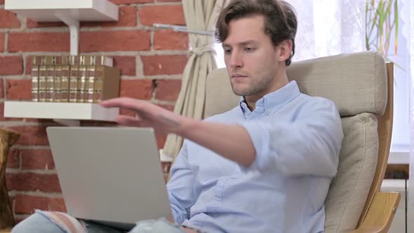 Ambitious Young Man Leaving Office Desk 