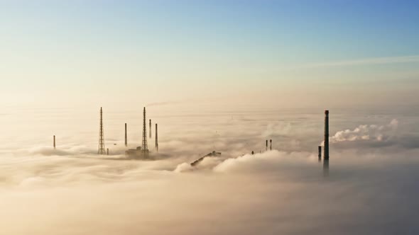 Aerial View of Factory in Mist