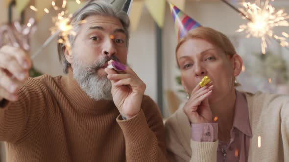 Happy Senior Couple On Birthday Party