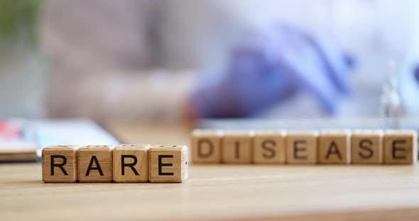 Wooden Cubes on the Table Inscription Rare Diseases