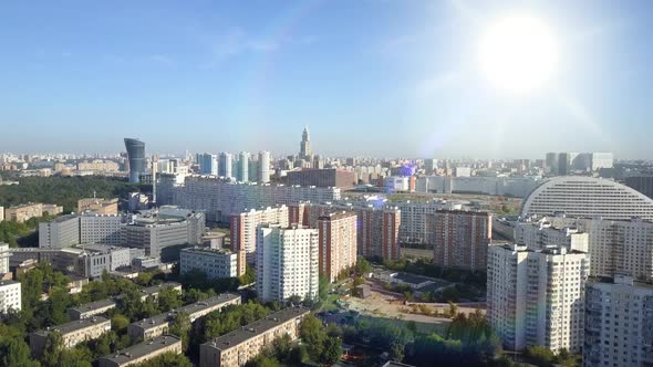 Many High-rise Apartment Buildings in the Morning Sunny Weather Against the Horizon with a Blue Sky