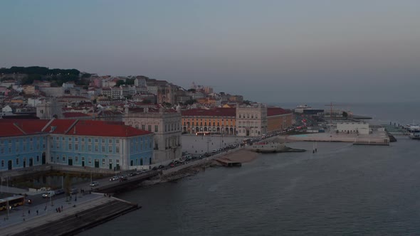 Aerial View of Busy Car Traffic on Coastal Road Past Praca Do Comercio Square in Lisbon City Center