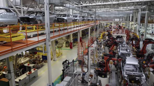 Panoramic View of a Modern Car Factory Production Using Robots