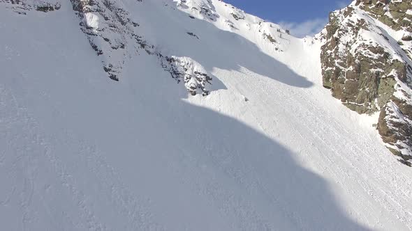 Aerial view of snow covered mountains