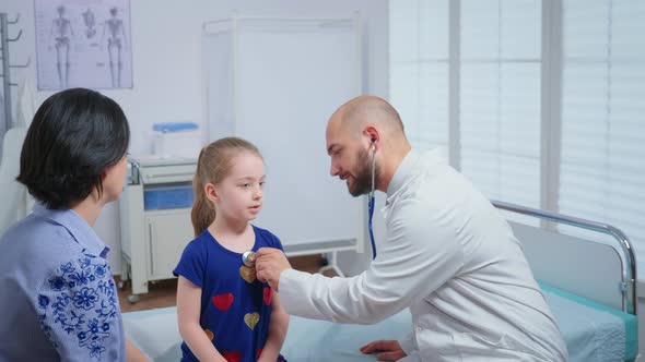 Medical Practitioner Listening Heartbeat