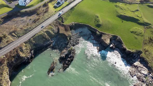 Aerial Shot of the Sunny Rocky Coast of Portnablagh Co