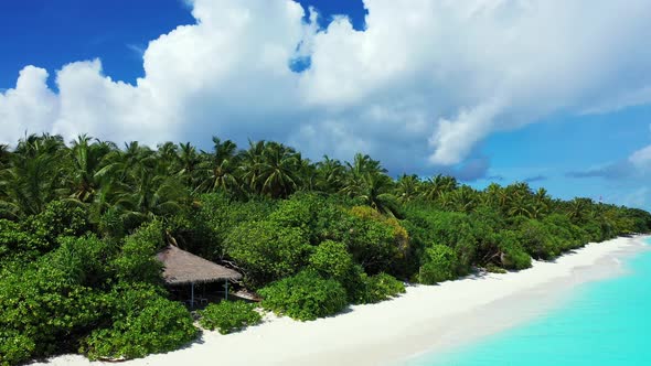 Beautiful drone abstract shot of a sandy white paradise beach and aqua turquoise water background in