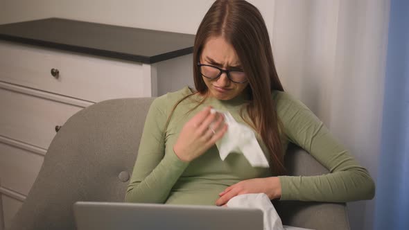 Upset Woman in Glasses Cry While Using Laptop Watching Content Browsing Internet
