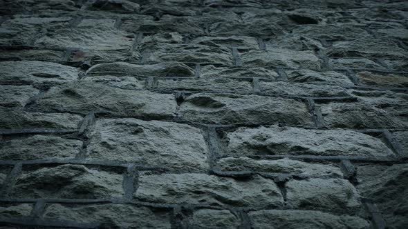 Imposing Stone Wall Low Angle Moving Shot