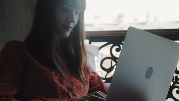 Freelance Work Concept, Close-up on Happy Beautiful Brunette Businesswoman Using Laptop in Bed