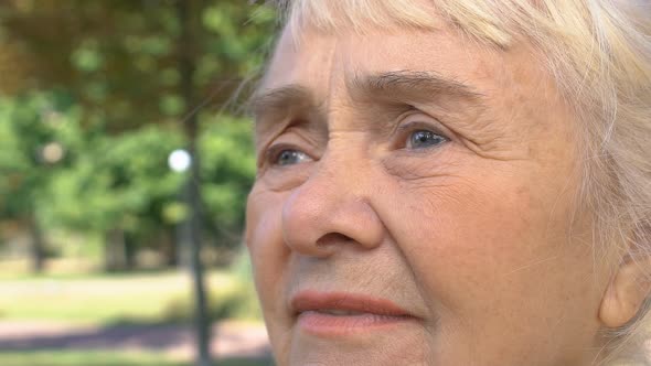 Elderly Caucasian Woman Waiting Resting Park, Enjoying Nature View, Tranquility