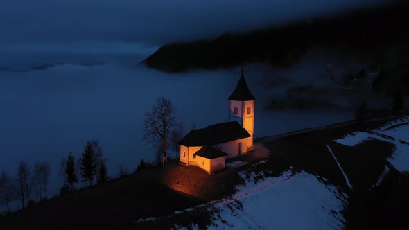 Church of St. Primoz and Felicijan at Night. Jamnik, Slovenia. Aerial View