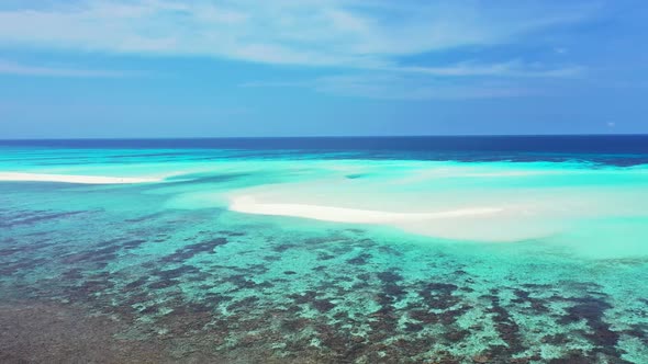 Aerial seascape of tranquil sea view beach trip by blue green sea and clean sandy background of a da