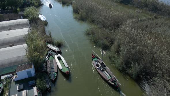 Aerial Drone Footage of Boats with Tourists on It to Visit the Natural Park of the Albufera in