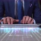 Businessman Writing On Hologram Table Economics Word  Economic Data - VideoHive Item for Sale