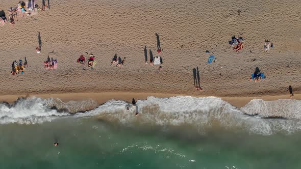 Aerial View on People in Sea Ocean