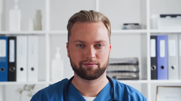 Professional medical doctor in hospital office, Portrait of young and confident physician.