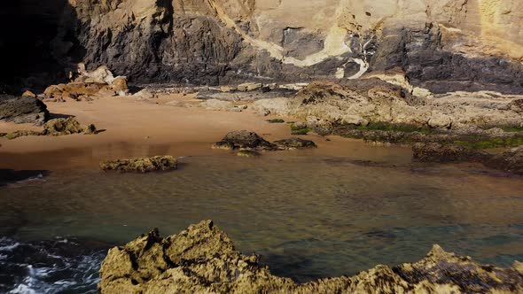 Large cliffs and rocky beach in Portugal