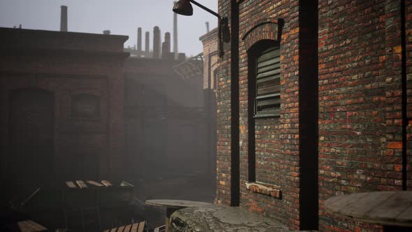 Abandoned Industrial Factory Buildings at Sunset alt