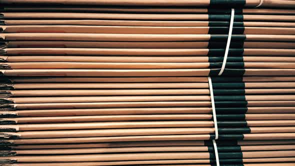 Side view of a corrugated cardboard pile in a factory