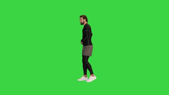 Running Fitness Man Using Phone to Take a Photo on a Green Screen Chroma Key