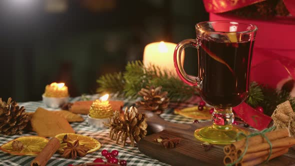 Hot Wine in Glass Mugs Gluhwein and Cinnamon Closeup