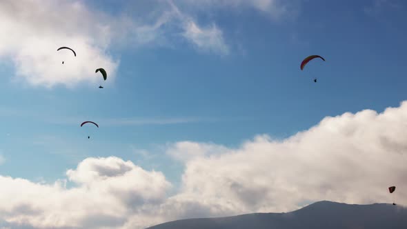 Paragliding Active Sport Against Giant Mountains in Highland