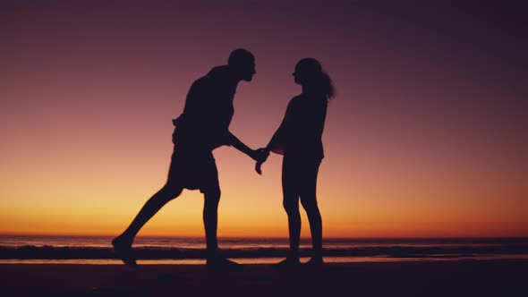 Young couple by the sea