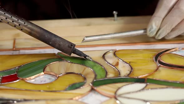 Solder and Soldering Iron with a Stained Glass