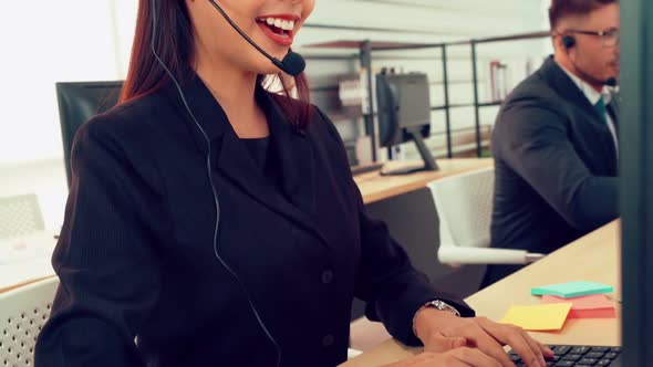 Business People Wearing Headset Working in Office