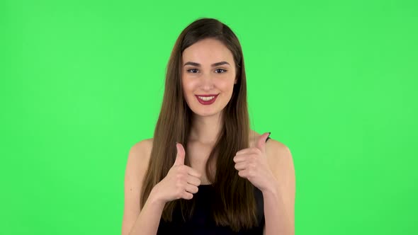 Young Cheerful Woman Showing Thumbs Up, Gesture Like
