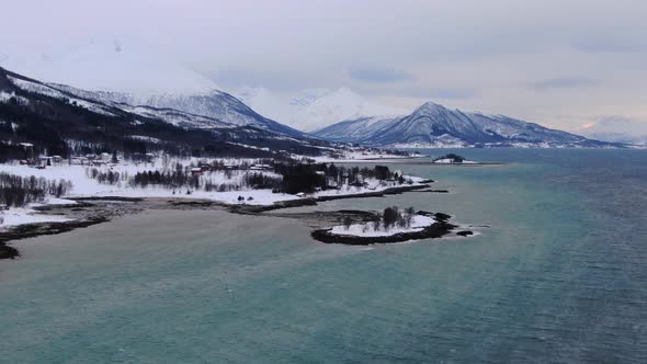 Aerial view of a fjord and mountains near Tromso city in Northern Norway, Arctic